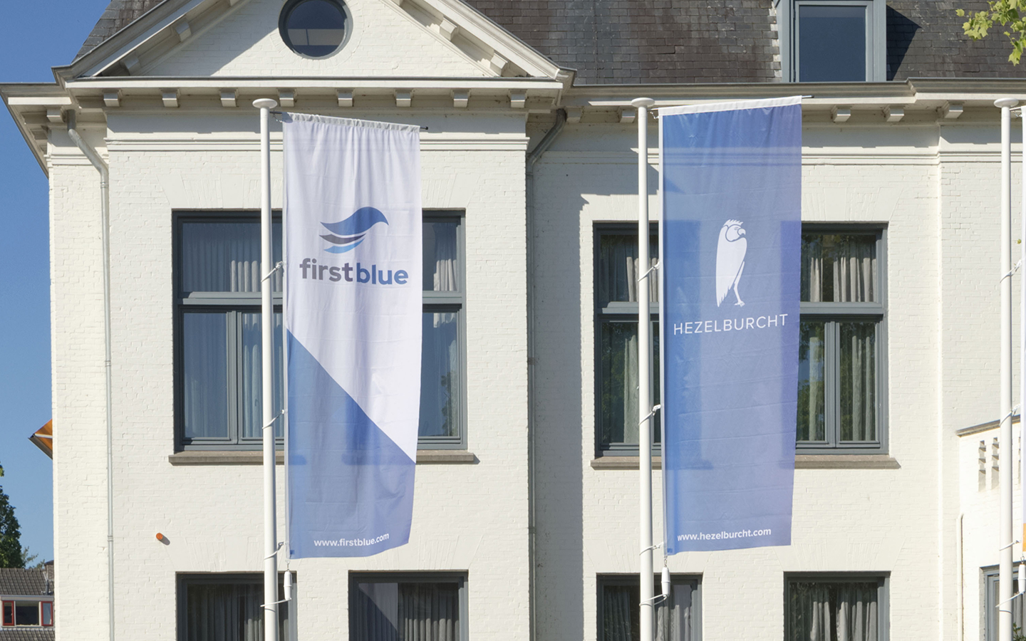 firstblue hezelburcht flags