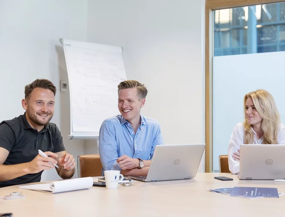 FirstBlue colleagues in a meeting
